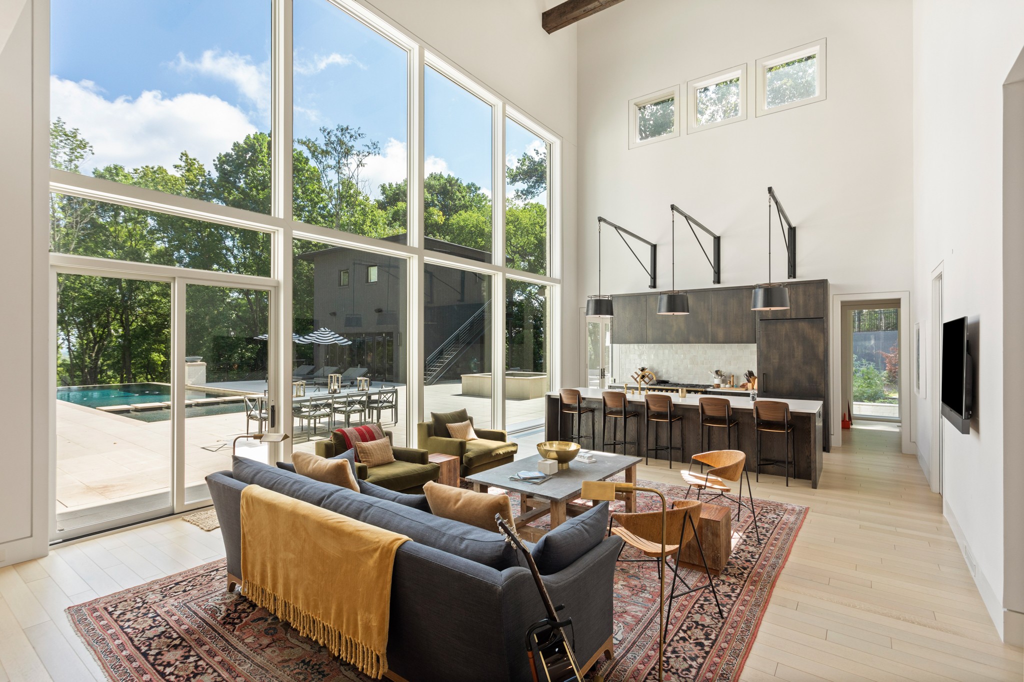 960 Overton Lea Road Nashville, TN 37220 - Photo 7 of 50 a living room with furniture large window and a flat screen tv