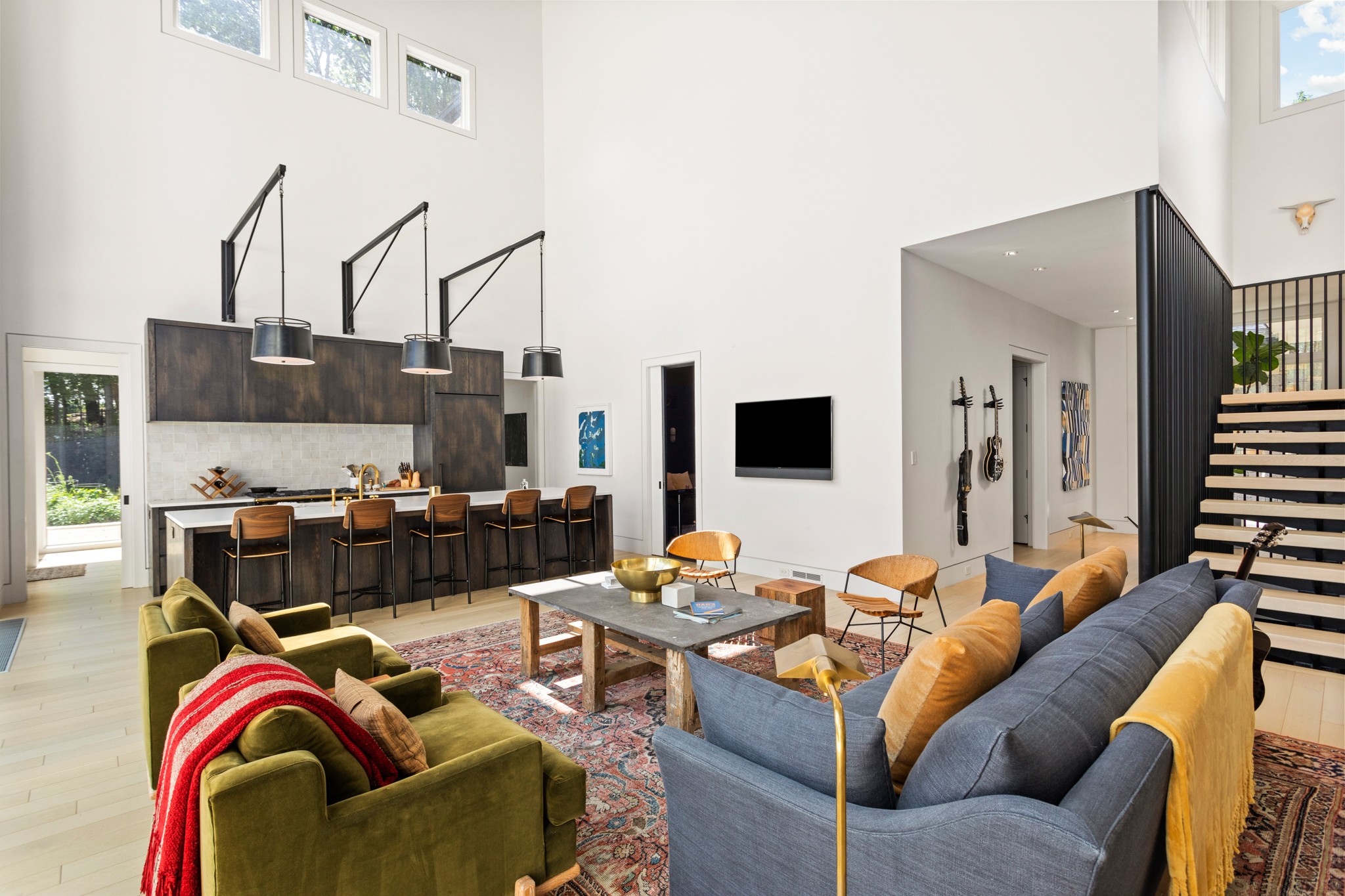 960 Overton Lea Road Nashville, TN 37220 - Photo 8 of 50 a living room with furniture and a flat screen tv