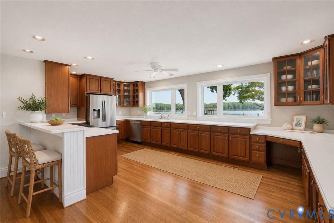 3032 North Riverside Drive Lanexa, VA 23089 - Photo 9 of 33 Kitchen featuring extensive wood cabinetry, white-