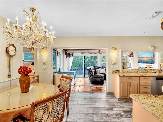 a kitchen with a sink stove and refrigerator