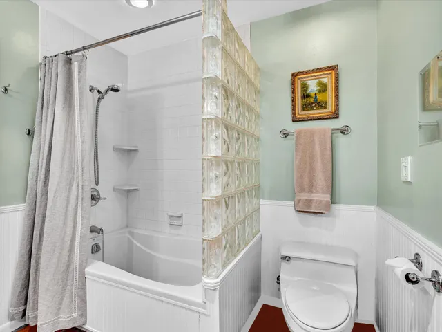 an aerial view of residential building and ocean