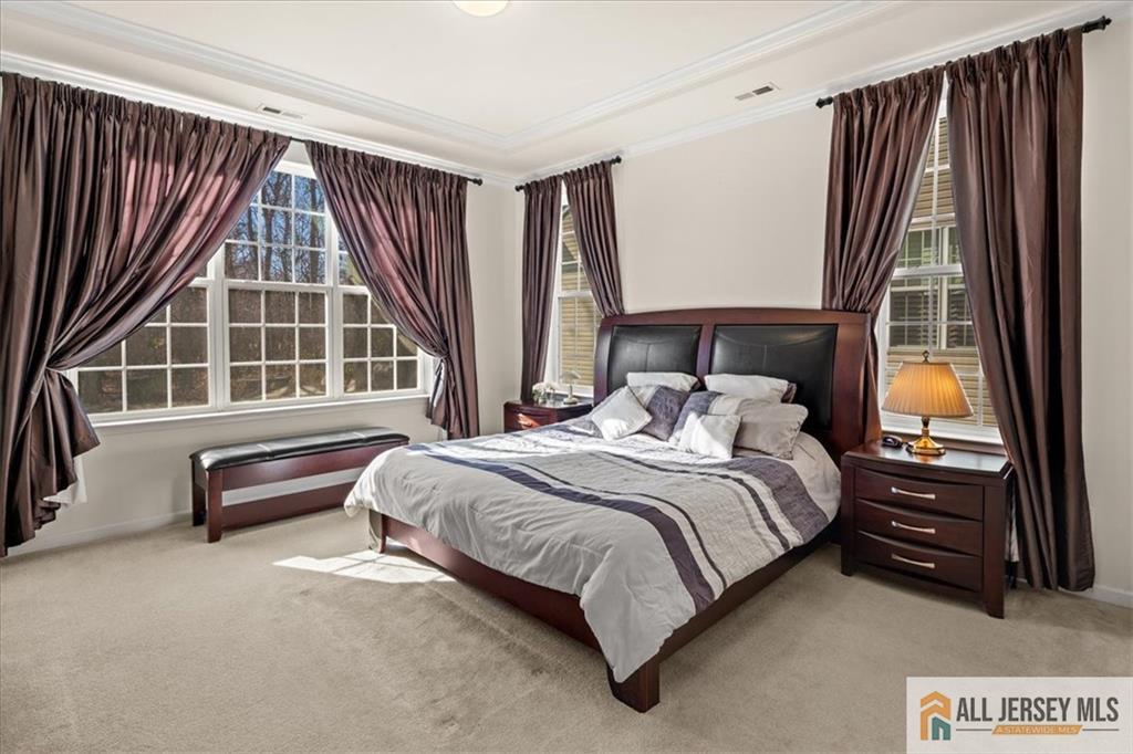 9 Bellingham Drive Kendall Park, NJ 08824 - Photo 23 of 65 a bedroom with a bed and a window