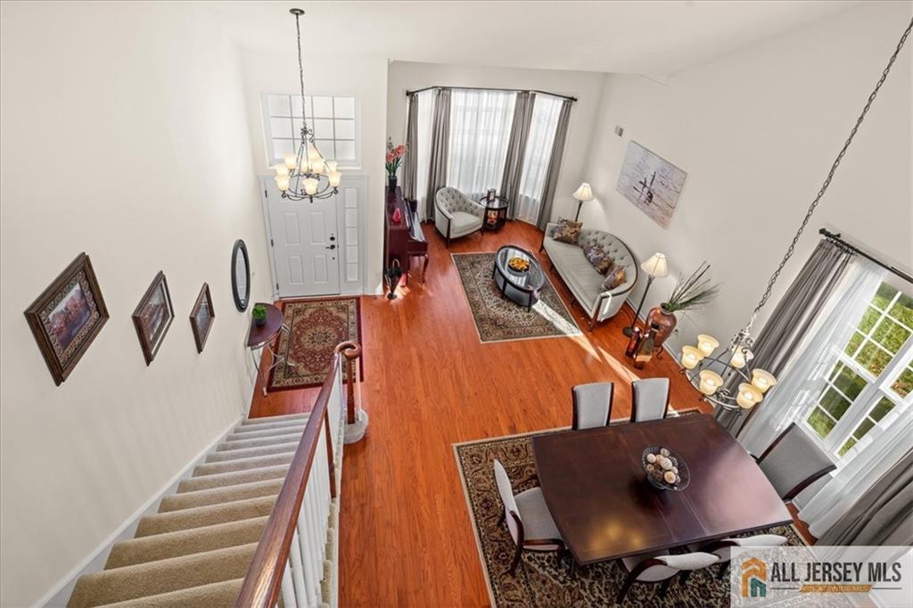 9 Bellingham Drive Kendall Park, NJ 08824 - Photo 30 of 65 a living room with furniture and a window