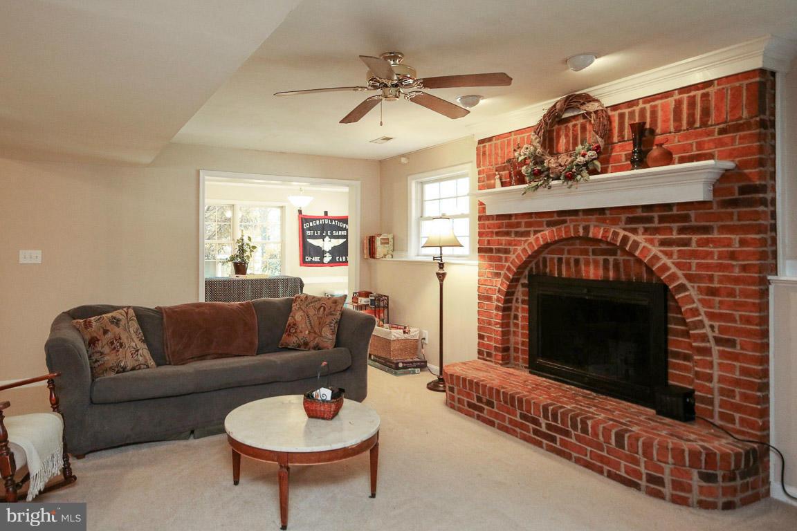 13 Riva Ridge Drive Stafford, VA 22556 - Photo 22 of 30 Basement family rm with wood burning fireplace