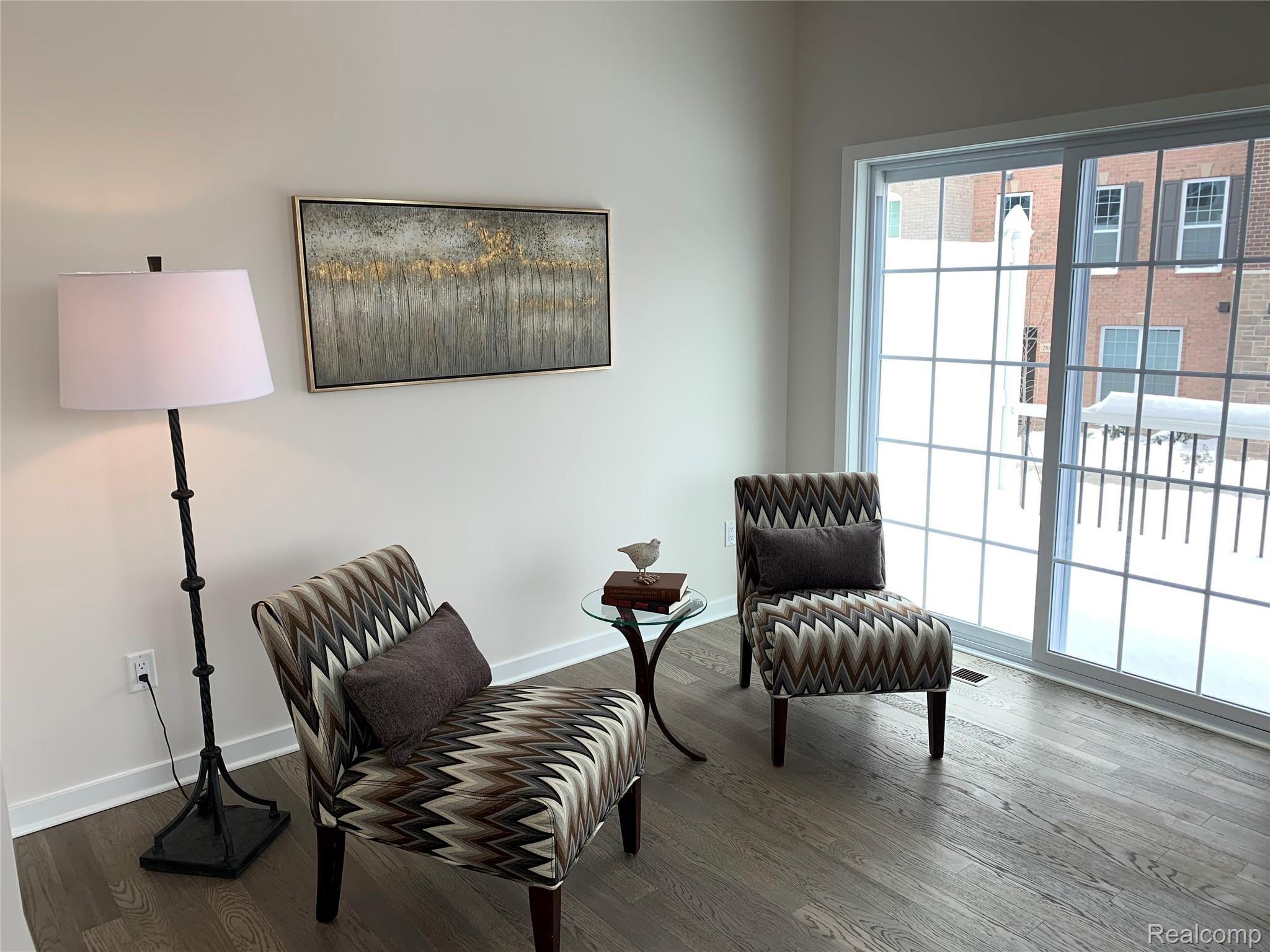 2831 Ridington Road, Unit 121 Ann Arbor, MI 48105 - Photo 9 of 23 121 Great Room to Trex Deck.jpg