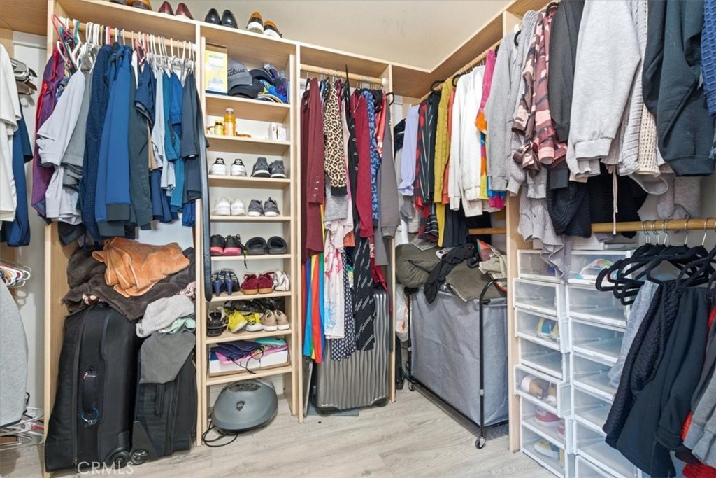 7959 Bothwell Road Reseda, CA 91335 - Photo 19 of 60 a view of walk in closet with clothes and shoes