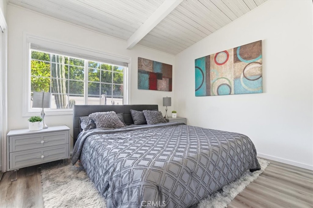 7959 Bothwell Road Reseda, CA 91335 - Photo 21 of 60 a bedroom with a bed and a window