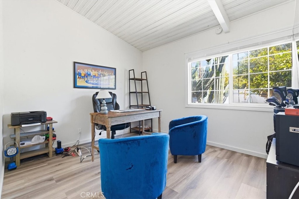 7959 Bothwell Road Reseda, CA 91335 - Photo 25 of 60 a living room with furniture and a window