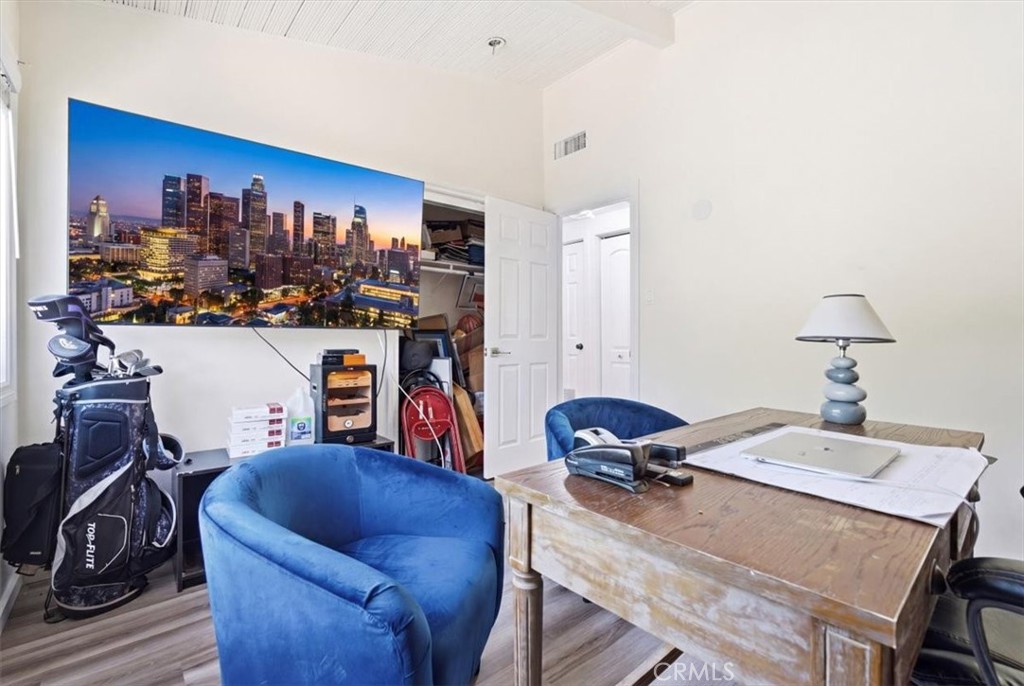 7959 Bothwell Road Reseda, CA 91335 - Photo 26 of 60 a view of a workspace with furniture and a kitchen