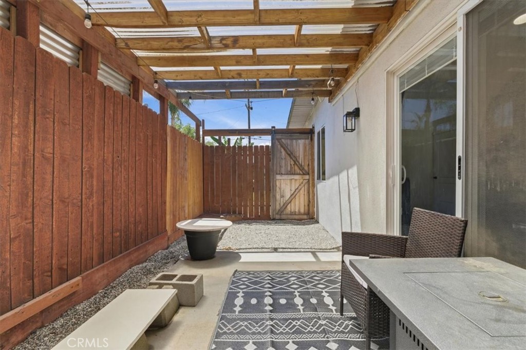 7959 Bothwell Road Reseda, CA 91335 - Photo 28 of 60 a view of a hallway with toilet and bathtub