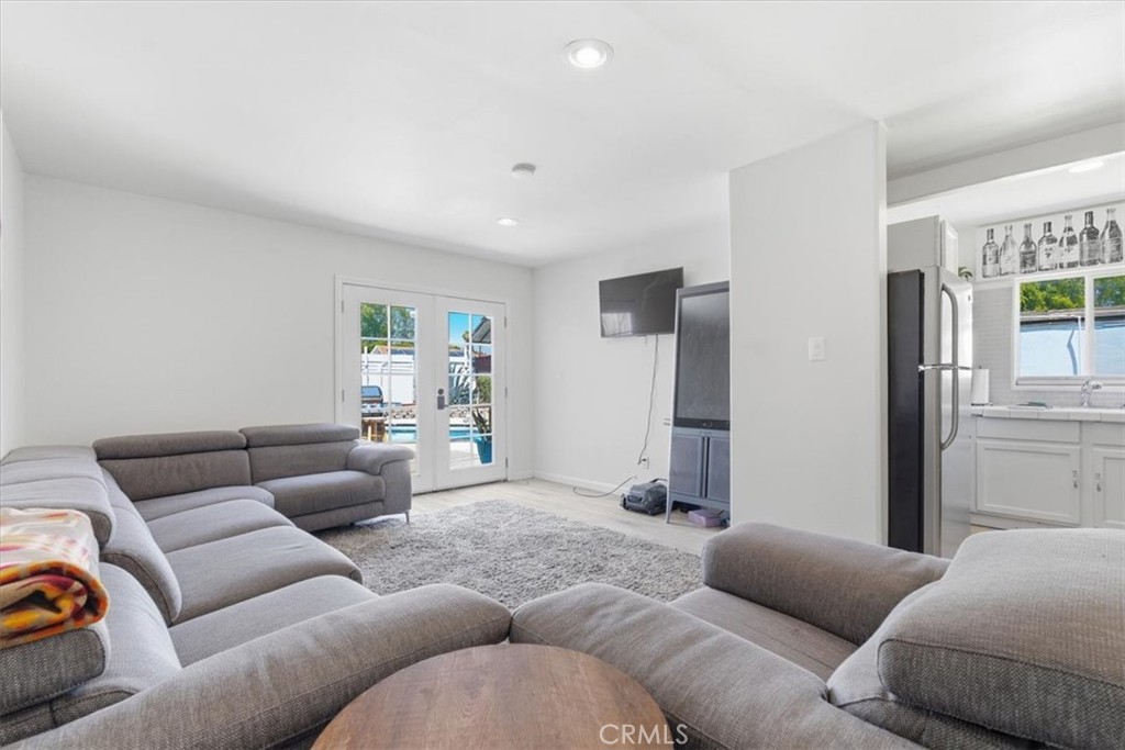 7959 Bothwell Road Reseda, CA 91335 - Photo 34 of 60 a living room with furniture and a couch