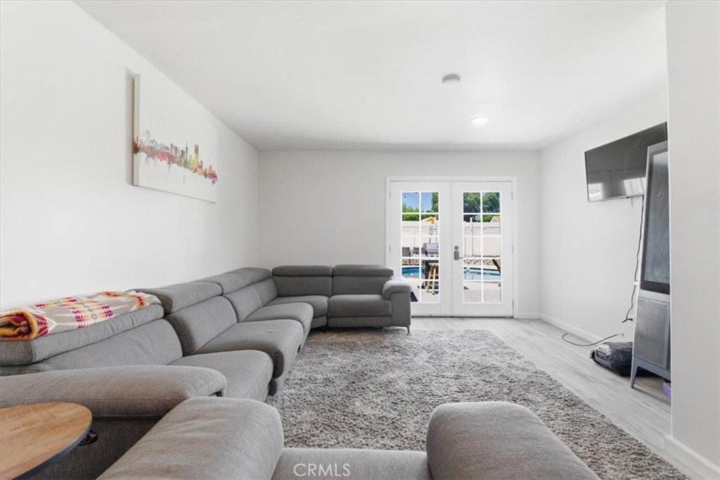 7959 Bothwell Road Reseda, CA 91335 - Photo 36 of 60 a living room with furniture and a couch