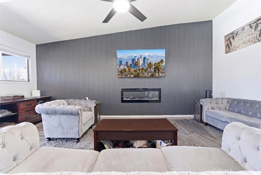 7959 Bothwell Road Reseda, CA 91335 - Photo 9 of 60 a living room with furniture and a couch