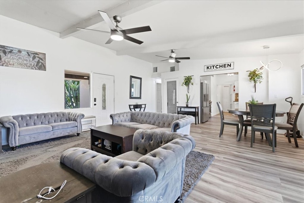 7959 Bothwell Road Reseda, CA 91335 - Photo 10 of 60 a living room with furniture and wooden floor