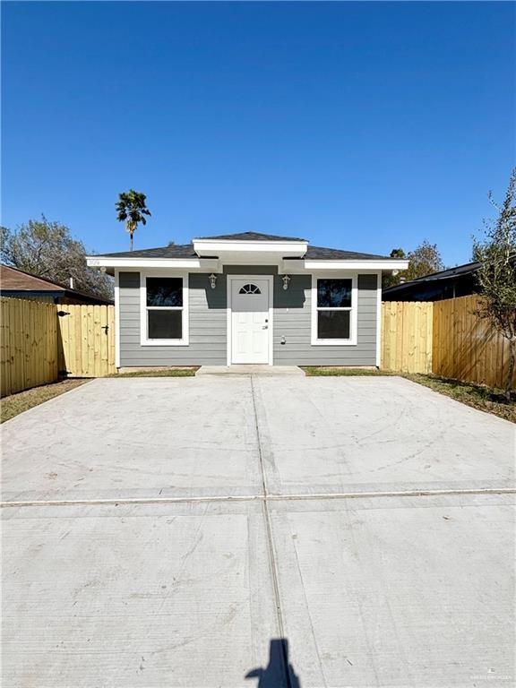 a front view of a house with a garage