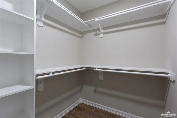 a view of an empty walk in closet