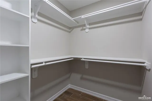 a view of an empty walk in closet