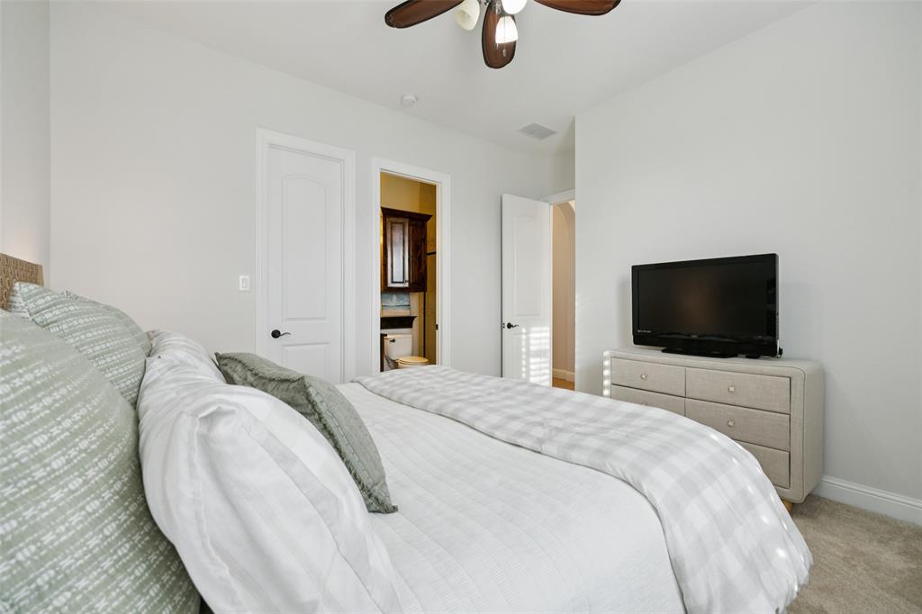 9 Reading Court Trophy Club, TX 76262 - Photo 27 of 40 Downstairs bedroom with ensuite