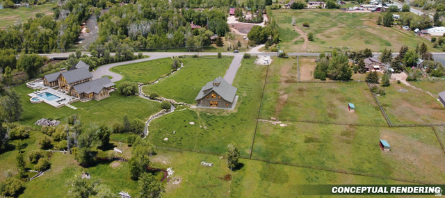 4347 South Bench Creek Road Kamas, UT 84036 - Photo 3 of 23 Expansive property featuring a custom-built log home, a separate barn structure, a large swimming pool with surrounding patio, a meandering water feature, and fenced paddocks
