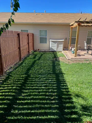 a view of a backyard with a garden
