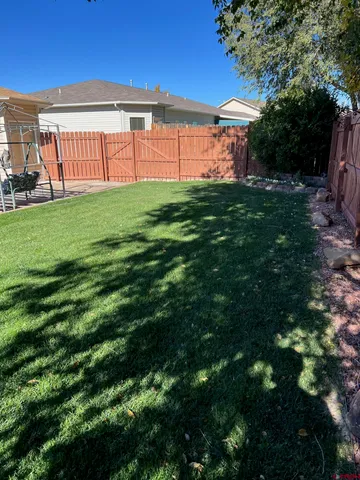 a view of a porch with a yard