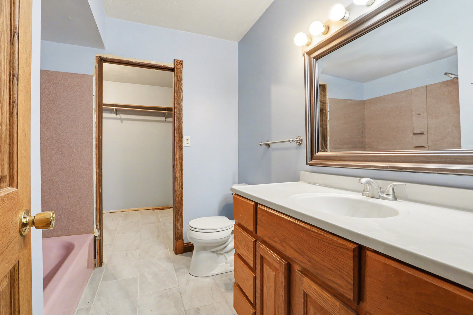 24304 South Frontage Road West Channahon, IL 60410 - Photo 15 of 26 a bathroom with a sink toilet and shower