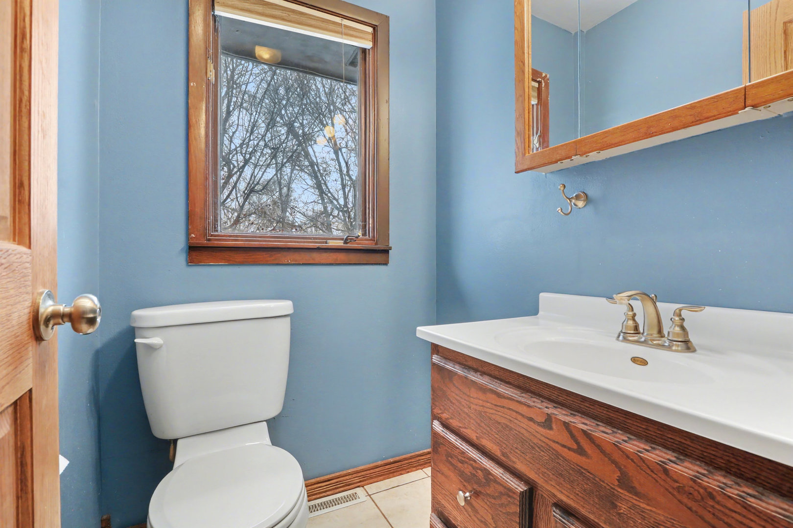 24304 South Frontage Road West Channahon, IL 60410 - Photo 18 of 26 a bathroom with a toilet sink and mirror