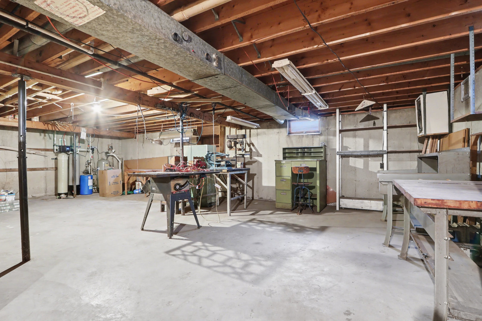24304 South Frontage Road West Channahon, IL 60410 - Photo 20 of 26 a view of a storage room with a table and chairs