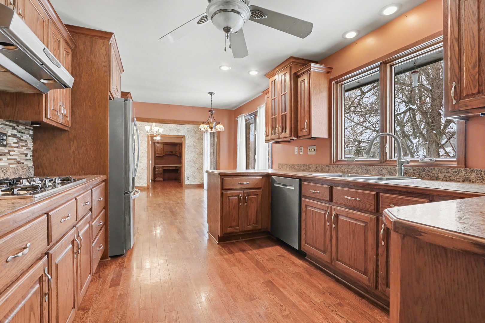 24304 South Frontage Road West Channahon, IL 60410 - Photo 10 of 26 a kitchen with stainless steel appliances granite countertop a stove and a sink