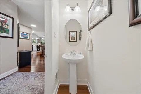 a view of a hallway with seating area