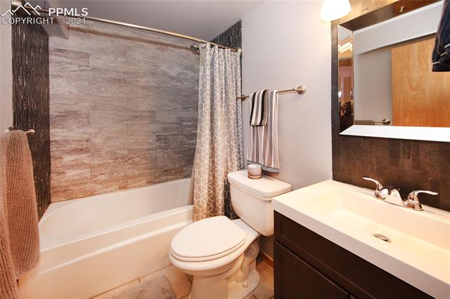 8084 Oliver Road Peyton, CO 80831 - Photo 25 of 33 Updated basement bathroom