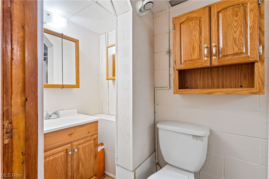 8899 Priem Road Strongsville, OH 44149 - Photo 26 of 35 Bathroom with vanity and toilet