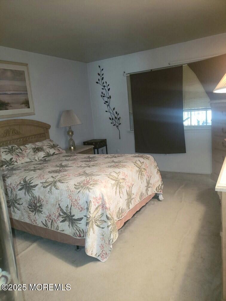 66 Breeze Court, Unit 97 Brick, NJ 08724 - Photo 12 of 18 a bathroom with a sink and a mirror