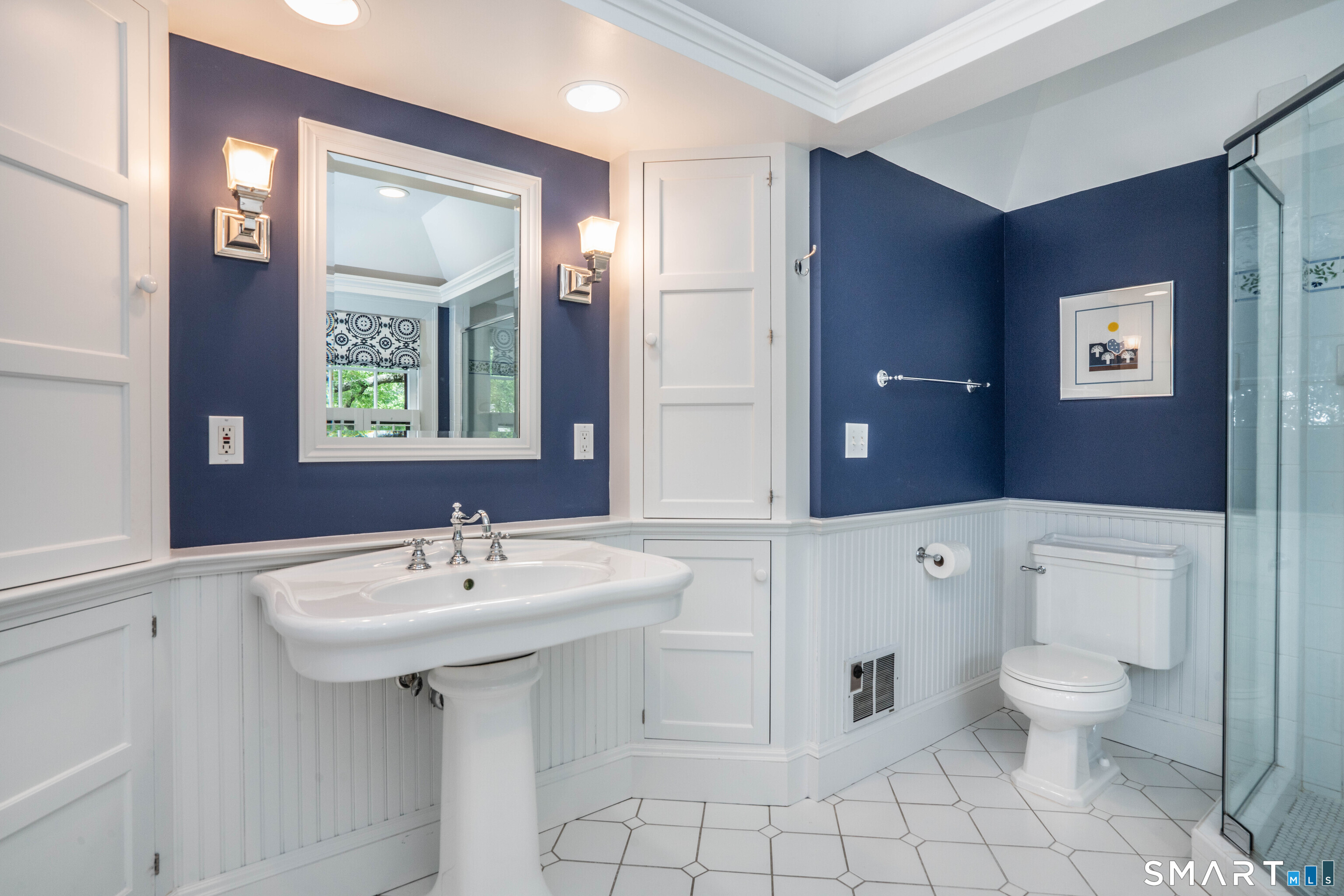 7 Fernwood Road West Hartford, CT 06119 - Photo 20 of 40 a spacious bathroom with a sink toilet and mirror