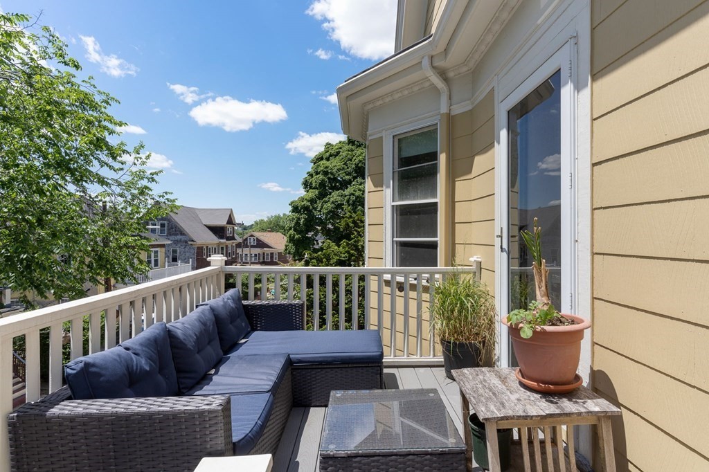 10-12 Castlerock Street, Unit 2 Boston, MA 02125 - Photo 18 of 24 a view from deck having patio