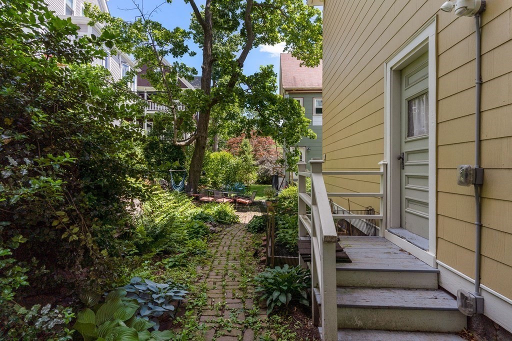 10-12 Castlerock Street, Unit 2 Boston, MA 02125 - Photo 23 of 24 a view of house with a tree