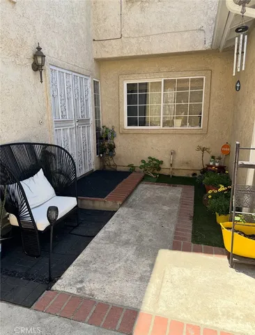 a swimming pool with outdoor seating