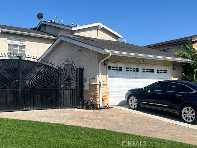 a view of a car parked front of a building