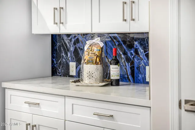 a view of a dining room with furniture and window