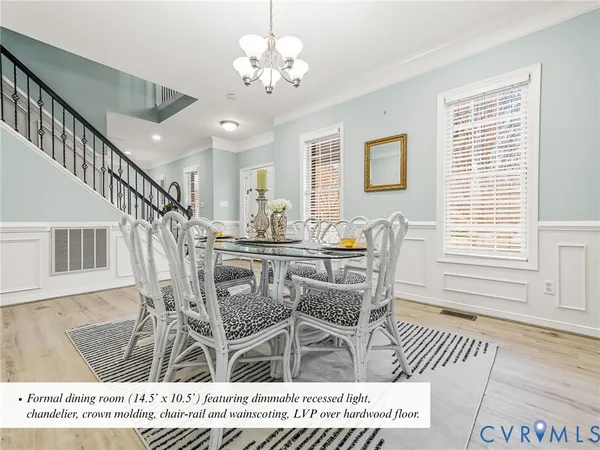 a kitchen with stainless steel appliances kitchen island granite countertop a refrigerator stove and sink