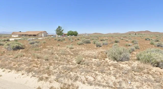 a view of mountain view with mountains in the background