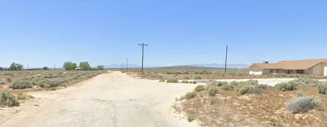 a view of a covered with snow in the yard