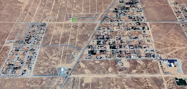 a bathroom with a shower and a toilet