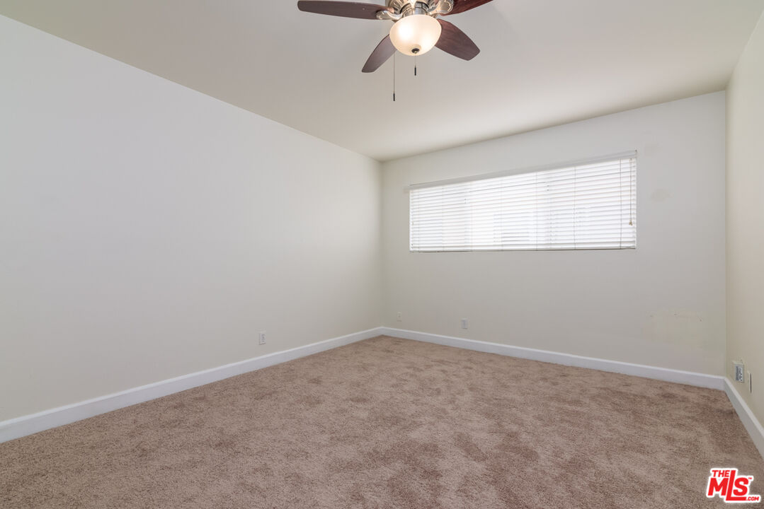 1920 North H Street, Unit 246 Oxnard, CA 93036 - Photo 15 of 31 an empty room with a window