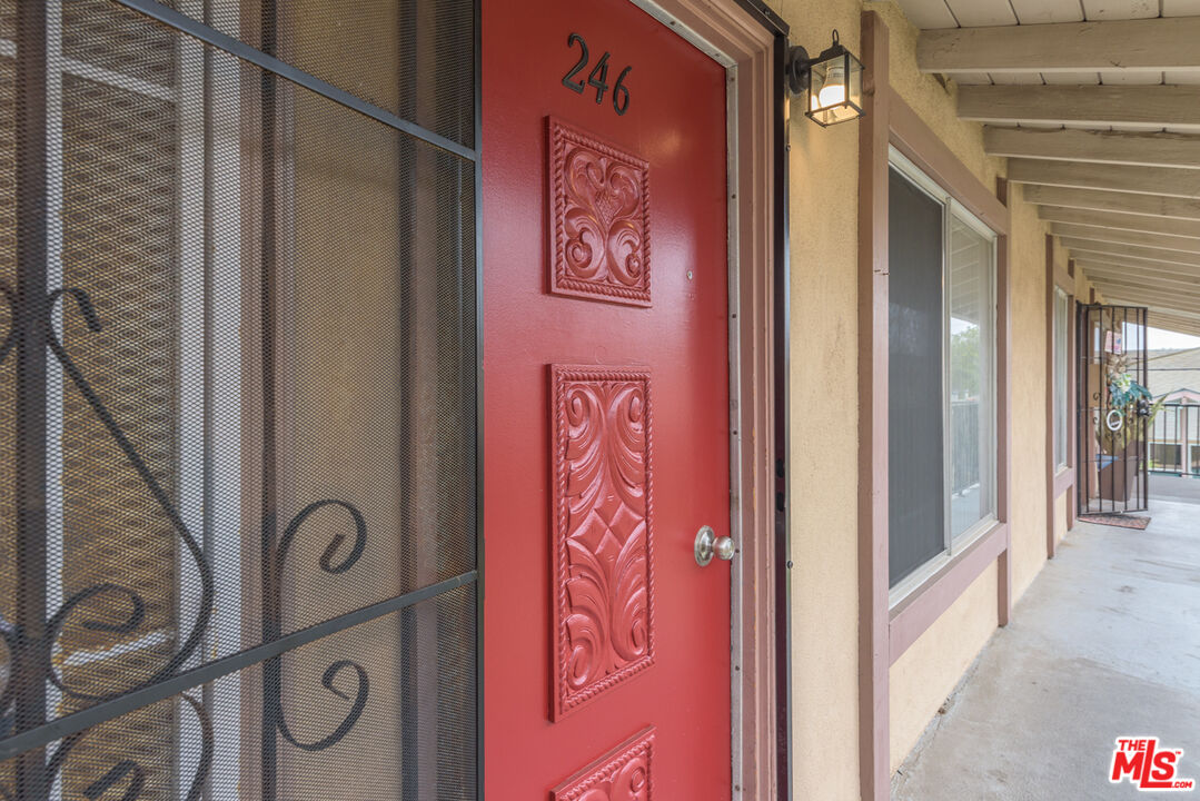 1920 North H Street, Unit 246 Oxnard, CA 93036 - Photo 20 of 31 a door with a front door