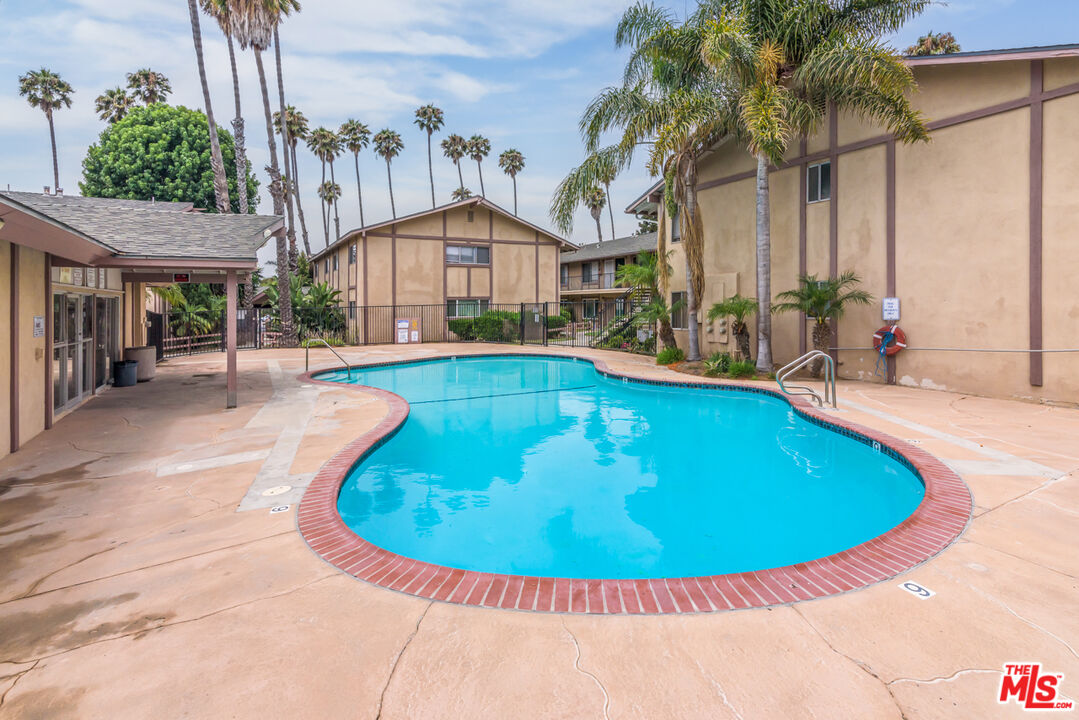 1920 North H Street, Unit 246 Oxnard, CA 93036 - Photo 23 of 31 a view of a swimming pool with a patio