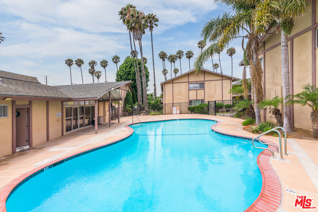 1920 North H Street, Unit 246 Oxnard, CA 93036 - Photo 24 of 31 a view of a house with swimming pool and porch