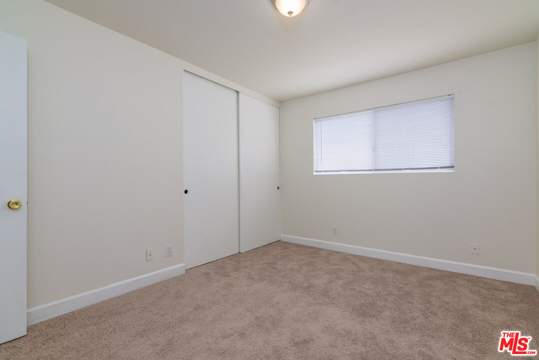 1920 North H Street, Unit 246 Oxnard, CA 93036 - Photo 31 of 31 an empty room with a window