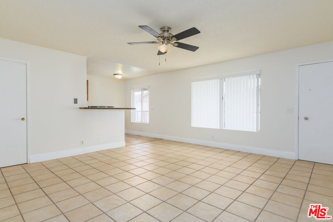 1920 North H Street, Unit 246 Oxnard, CA 93036 - Photo 4 of 31 a view of an empty room and window