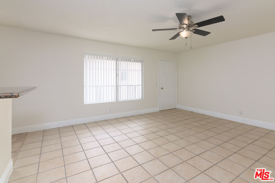1920 North H Street, Unit 246 Oxnard, CA 93036 - Photo 6 of 31 a view of an empty room and window